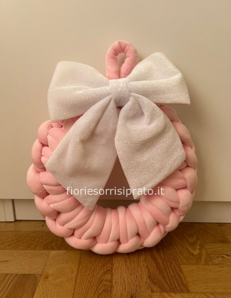 Ghirlanda rosa con filo rosa e fiocco